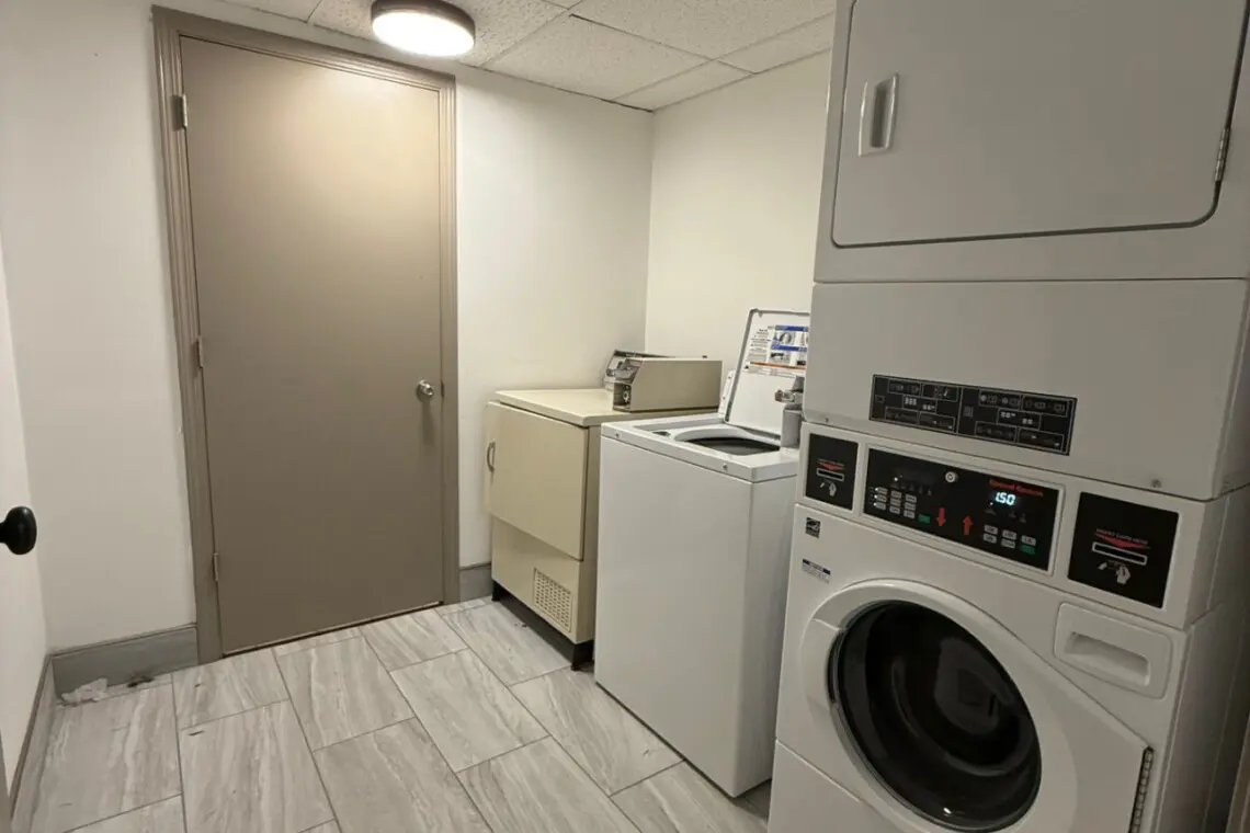 Guest laundry room with washer and dryer at Nisswa Hotel & Suites in Nisswa MN